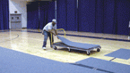 Carpeted mats protect gym floors during special events