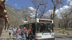 Hybrid-powered buses travel through national park