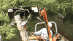 Quick-attach tool uproots trees, moves boulders