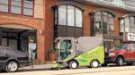 Compact sweeper cleans tight spaces