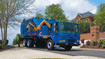 Automated refuse collection vehicle features stronger arm