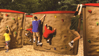 Climbing walls let youngsters scramble horizontally over simulated boulders