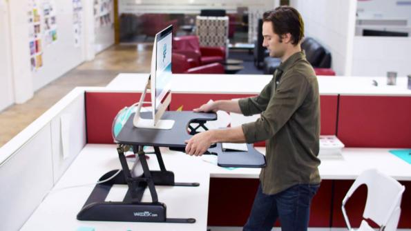 More government workers are using standing desks at the office (with related video)