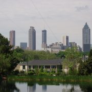 The Atlanta skyline with a green area in the foreground.